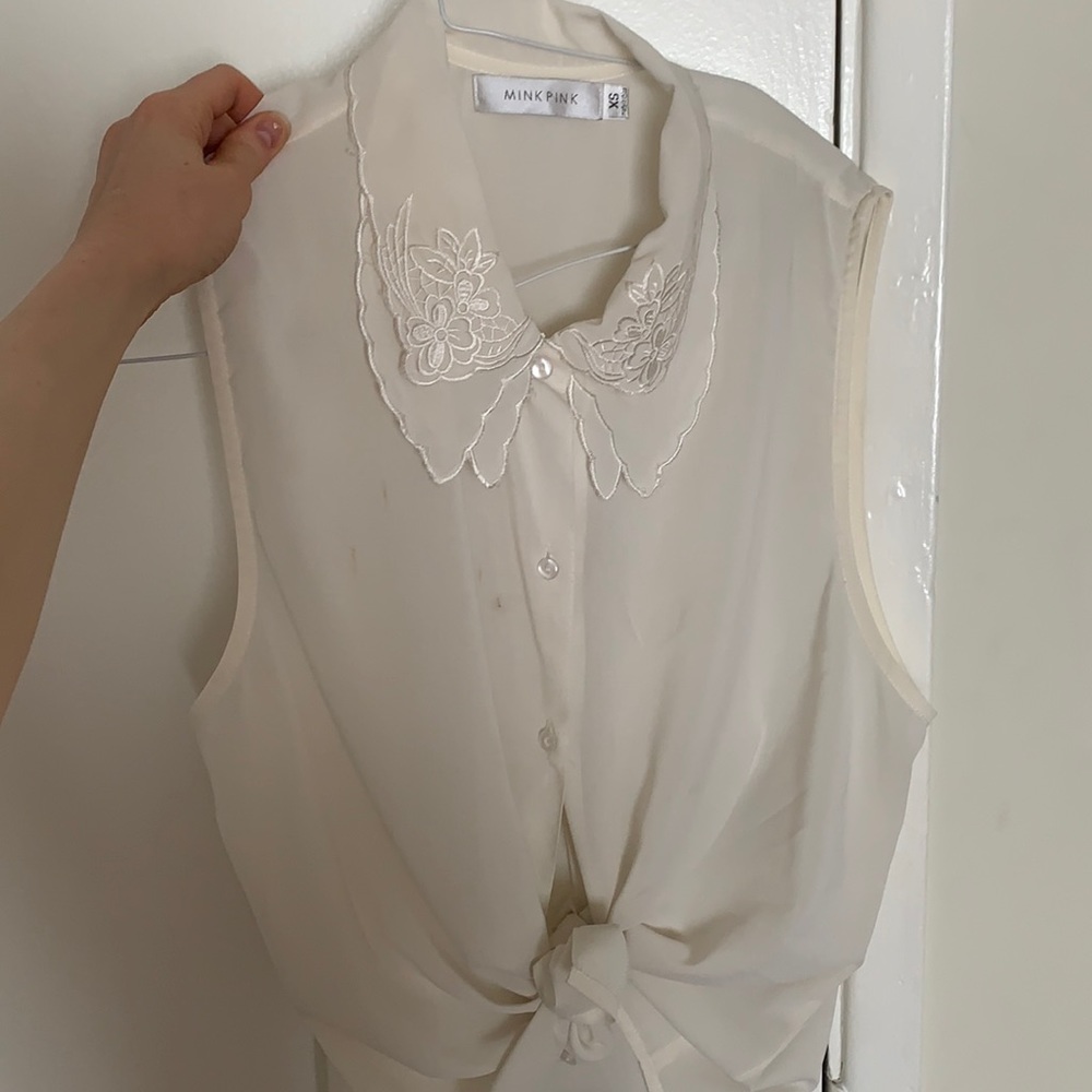 Sheer white tie up top with embroidered collar!